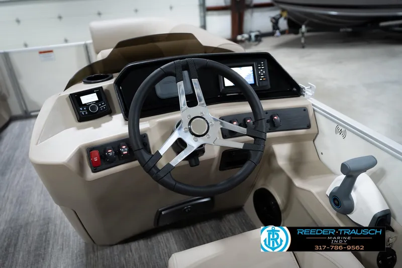 Slide: The Image of 2026 Bennignton 168 SL boat dashboard with steering wheel and control panel. - 29