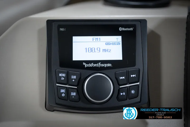 Slide: The Image of Rockford Fosgate PMX-1 stereo system in 2026 Bennignton 168 SL boat dashboard. - 32