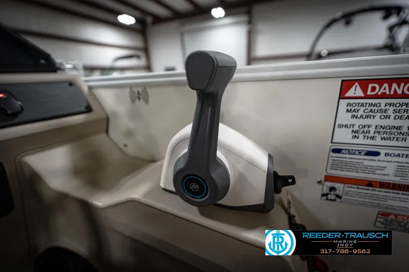 Slide: The Image of Throttle control of 2026 Bennignton 168 SL boat with safety warnings visible. - 36