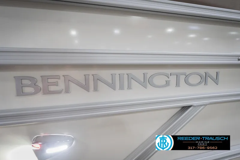 Slide: The Image of 2026 Bennington 168 SL boat with sleek design and branding details. - 54