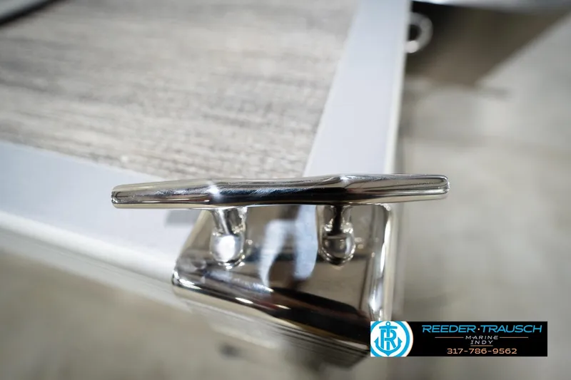 Slide: The Image of 2026 Bennignton 168 SL boat cleat detail with Reeder Trausch Marine logo. - 56