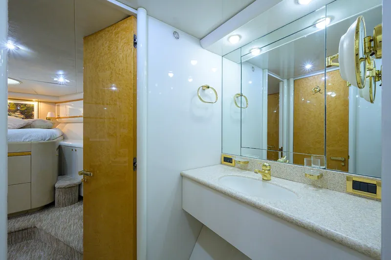 Slide: The Image of Lazzara 80 LOST TEXAN - Forward Head Sink & Stateroom Access - 24