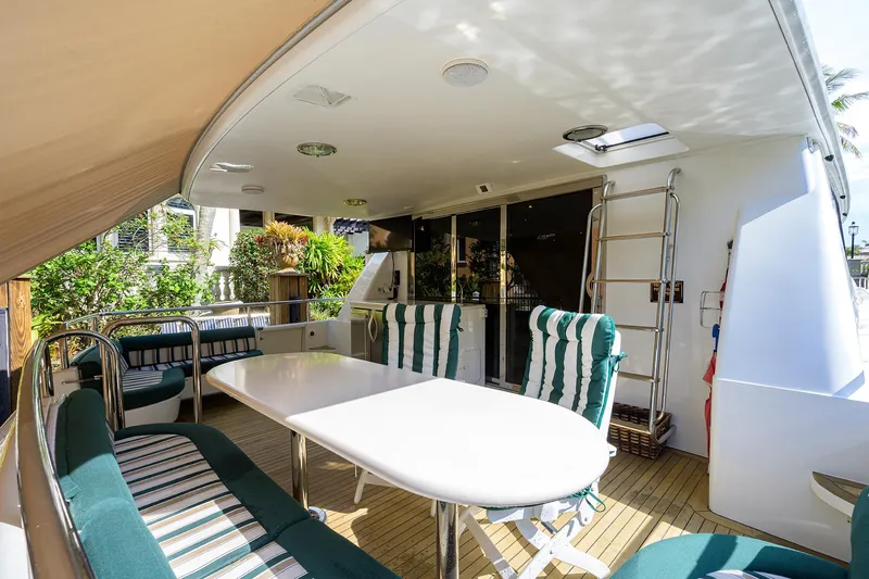 Slide: The Image of Lazzara 80 LOST TEXAN - Aft Deck Seating & Salon Entrance - 42