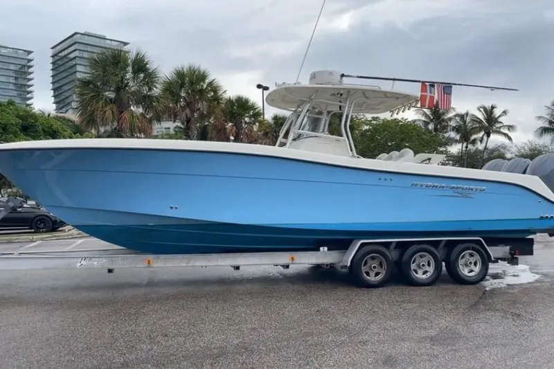The Image of 2007 Hydra-Sports Vector 3300 CC boat on trailer, parked near palm trees. - 1