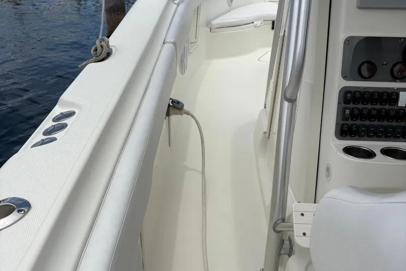 Slide: The Image of 2007 Hydra-Sports Vector 3300 CC boat interior with control panel and seating. - 3