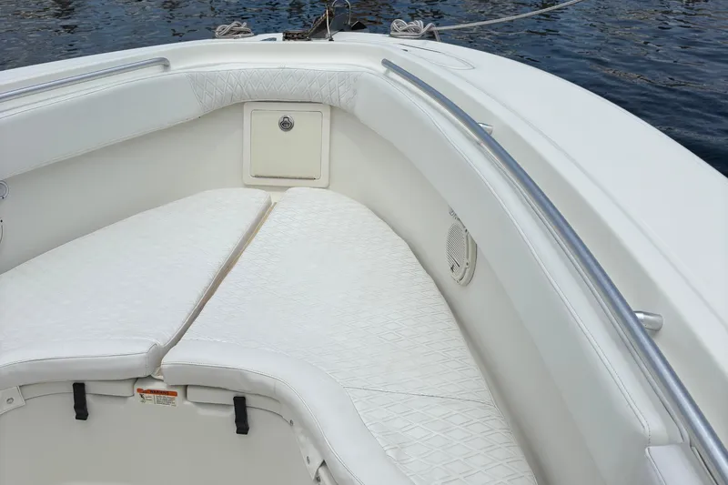 Slide: The Image of 2007 Hydra-Sports Vector 3300 CC boat interior with white cushioned seating. - 7