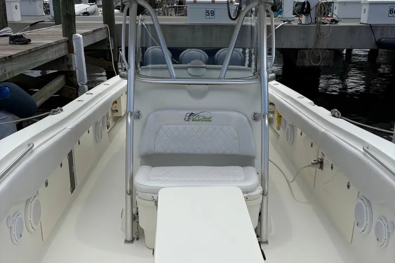 Slide: The Image of 2007 Hydra-Sports Vector 3300 CC boat interior with seating and console at dock. - 9