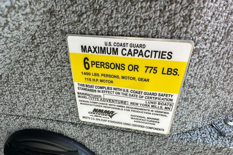 Slide: The Image of 2026 Lund 1775 Adventure Sport capacity label, 6 persons or 775 lbs, 115 HP motor. - 24