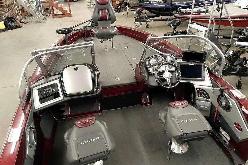 Slide: The Image of 2014 Ranger 621VS Fisherman boat interior with steering console and seating. - 12