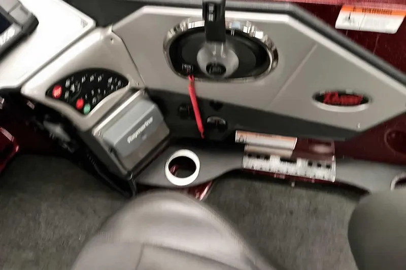 Slide: The Image of Control panel of 2014 Ranger 621VS Fisherman boat with steering and gauges. - 22