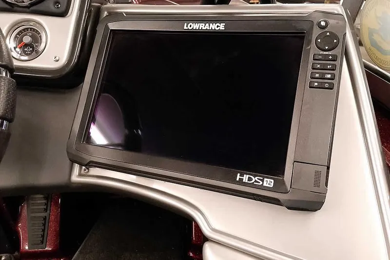 Slide: The Image of Lowrance HDS-12 fishfinder on 2014 Ranger 621VS Fisherman boat dashboard. - 24