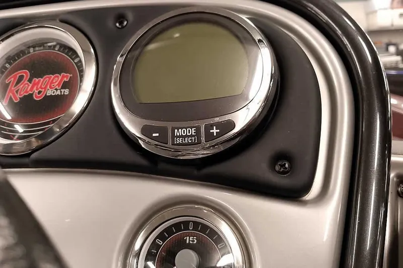 Slide: The Image of Dashboard of 2014 Ranger 621VS Fisherman boat with gauges and controls. - 25