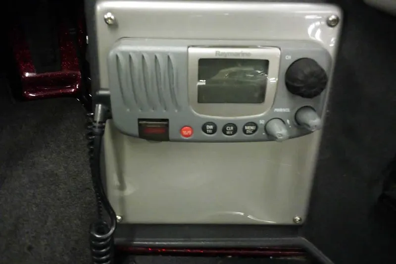 Slide: The Image of Control panel inside 2014 Ranger 621VS Fisherman boat, featuring a radio system. - 26