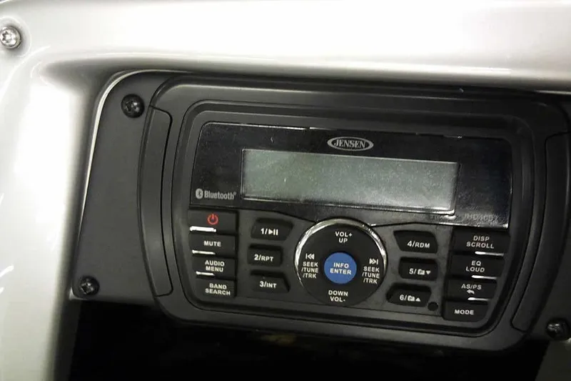 Slide: The Image of Jensen audio system in 2014 Ranger 621VS Fisherman boat dashboard, featuring Bluetooth connectivity. - 27