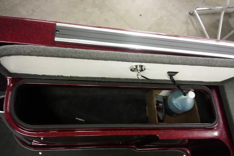 Slide: The Image of Storage compartment of 2014 Ranger 621VS Fisherman boat with cleaning supplies. - 30