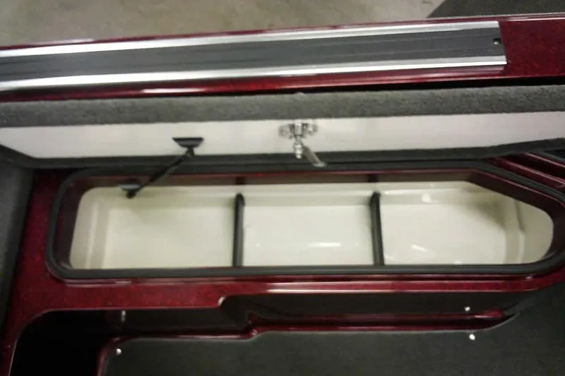 Slide: The Image of 2014 Ranger 621VS Fisherman boat storage compartment, open and empty. - 32