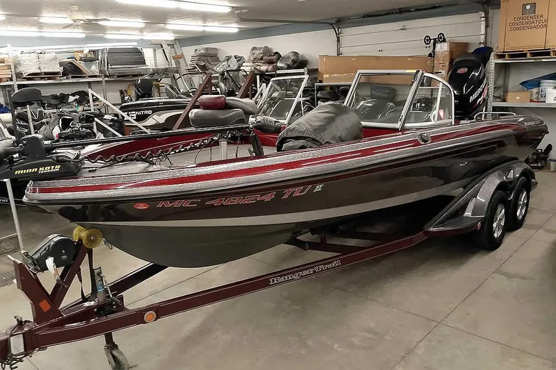 Slide: The Image of 2014 Ranger 621VS Fisherman boat in a garage, on a trailer. - 36