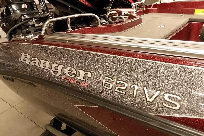Slide: The Image of 2014 Ranger 621VS Fisherman boat with metallic finish and branding details. - 4