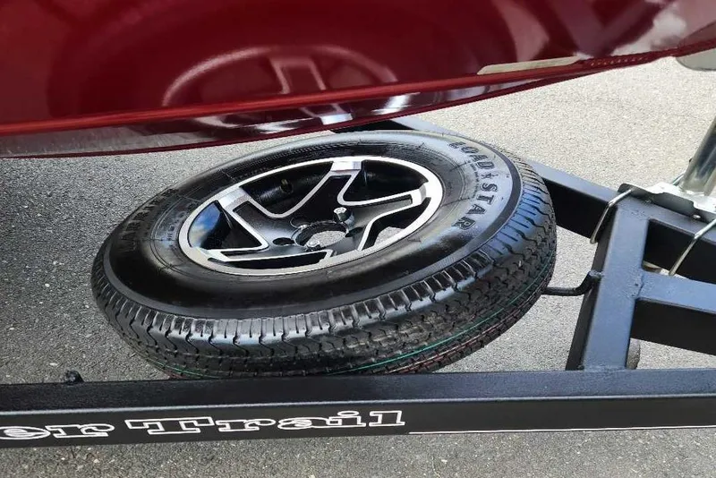 Slide: The Image of 2021 Ranger VS1782SC Angler trailer with spare tire on asphalt. - 7