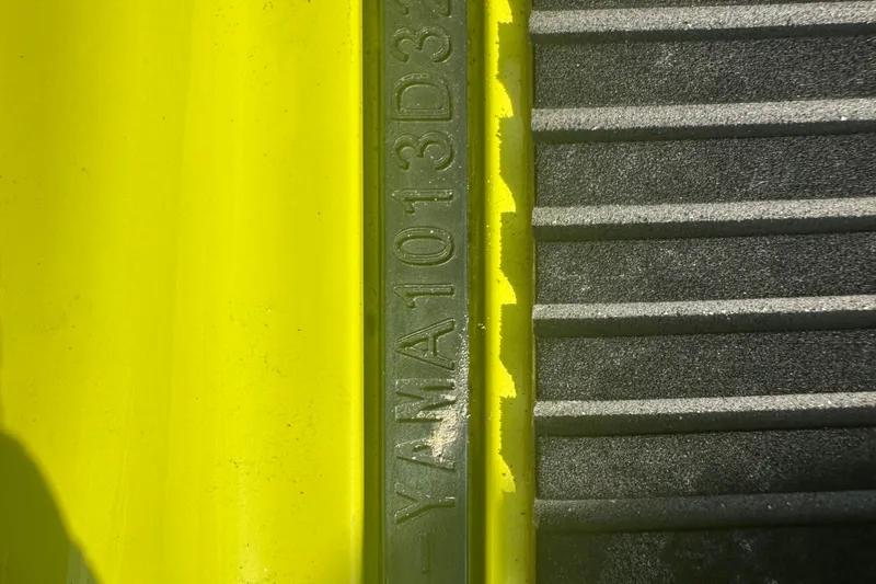 Slide: The Image of Close-up of 2023 Yamaha WaveRunner VX Cruiser HO, showing textured surface and serial number. - 10