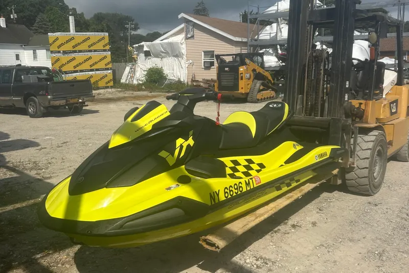 Slide: The Image of 2023 Yamaha WaveRunner VX Cruiser HO on forklift, vibrant yellow and black design. - 5