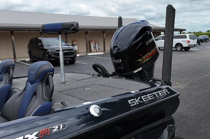 Slide: The Image of 2021 Skeeter FXR21 Apex boat with Yamaha VMAX engine in parking lot. - 11