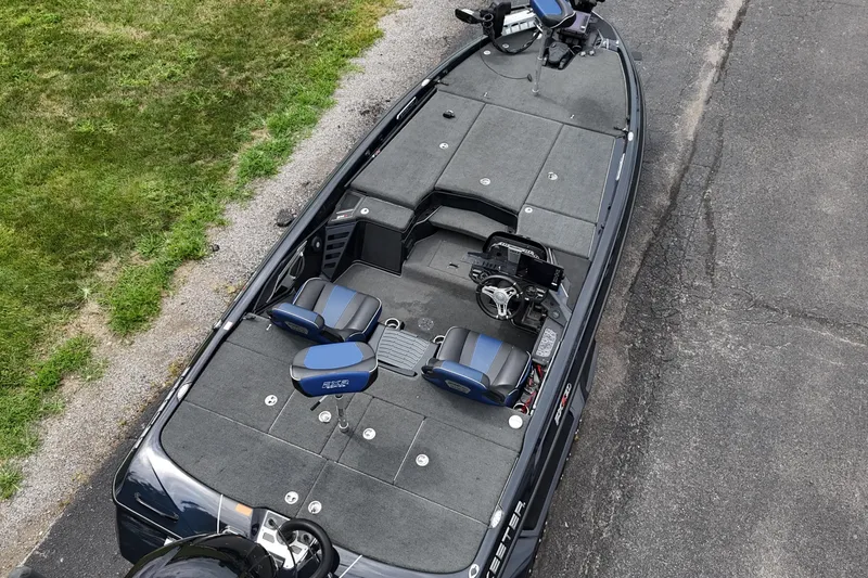 Slide: The Image of 2021 Skeeter FXR21 Apex fishing boat with dual seats and advanced controls. - 13