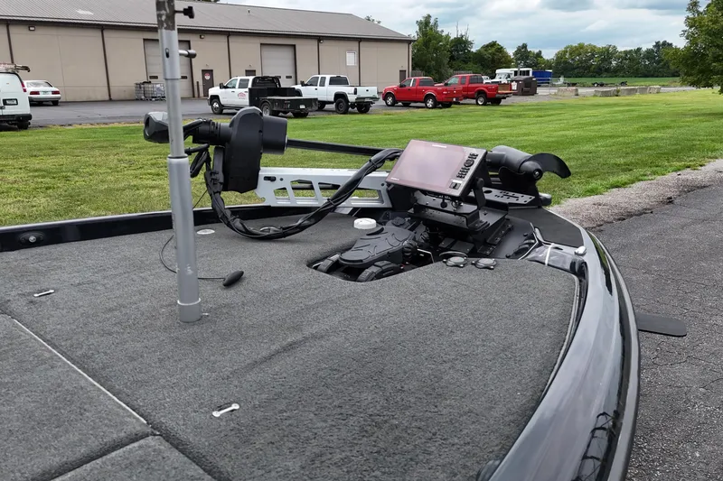 Slide: The Image of 2021 Skeeter FXR21 Apex boat with advanced navigation equipment on deck. - 6