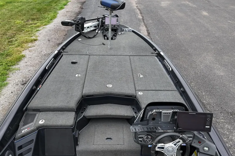 Slide: The Image of 2021 Skeeter FXR21 Apex boat interior with advanced navigation system and spacious deck. - 8