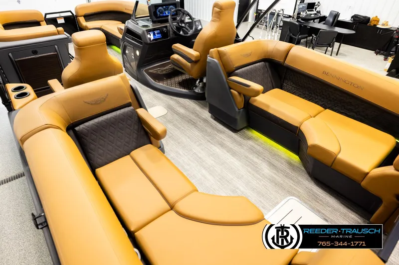 Slide: The Image of Luxurious interior of 2026 Bennington MFBSE boat with tan leather seating and modern dashboard. - 11