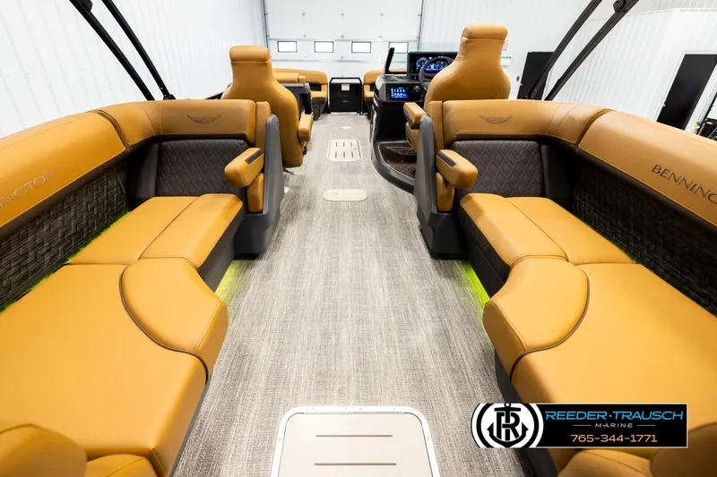 Slide: The Image of Luxurious interior of 2026 Bennington MFBSE boat with tan leather seating and modern dashboard. - 17