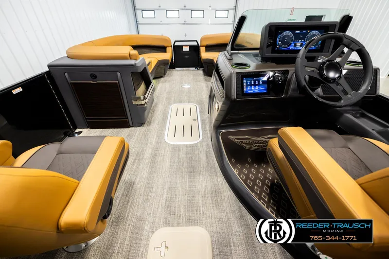 Slide: The Image of Luxurious interior of 2026 Bennington MFBSE boat with modern dashboard and plush seating. - 18