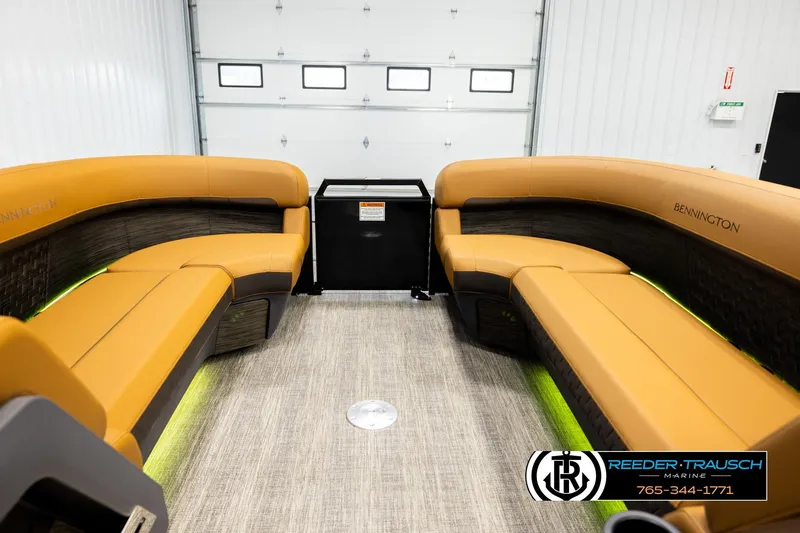 Slide: The Image of Luxurious interior of 2026 Bennington MFBSE pontoon boat with plush seating and modern design. - 19