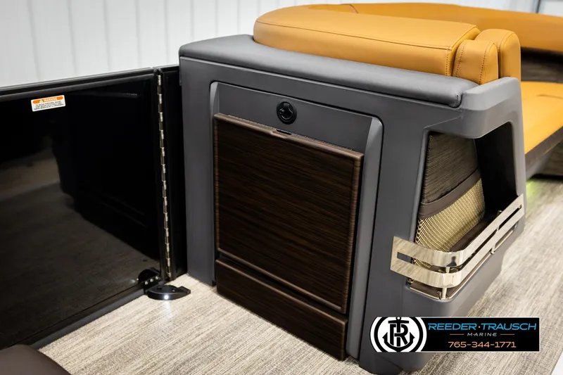 Slide: The Image of 2026 Bennington MFBSE boat interior with luxurious seating and storage features. - 22