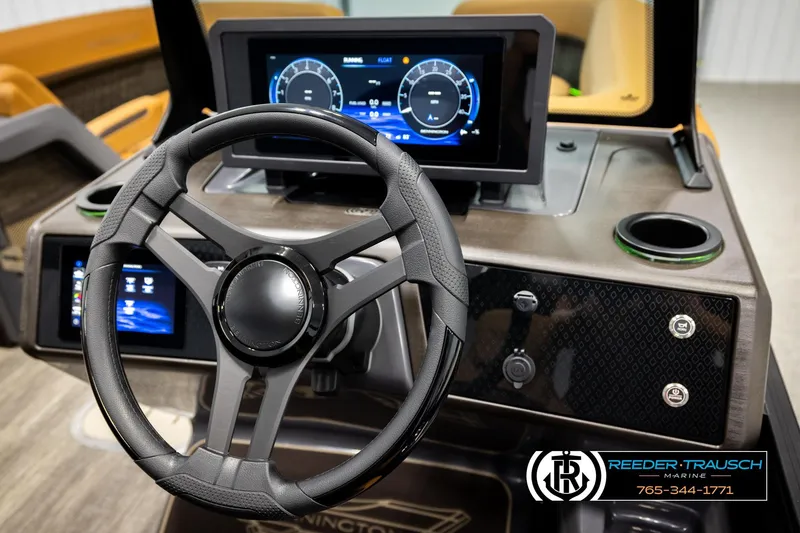 Slide: The Image of 2026 Bennington MFBSE boat dashboard with steering wheel and digital displays. - 27