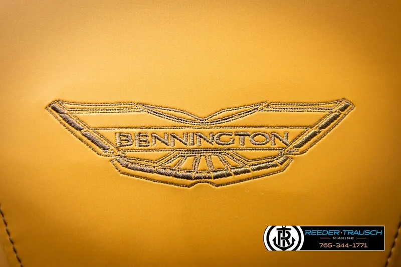 Slide: The Image of Bennington MFBSE 2026 logo on yellow leather with Reeder-Trausch Marine contact details. - 38