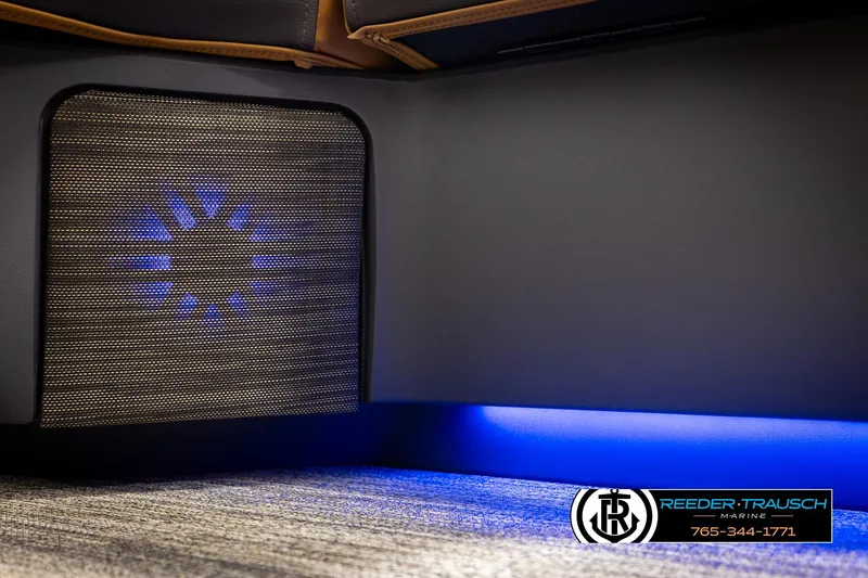Slide: The Image of 2026 Bennington MFBSE interior with blue LED lighting and speaker detail. - 42