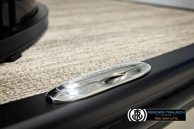 Slide: The Image of 2026 Bennington MFBSE boat detail with branded cleat and textured deck surface. - 52