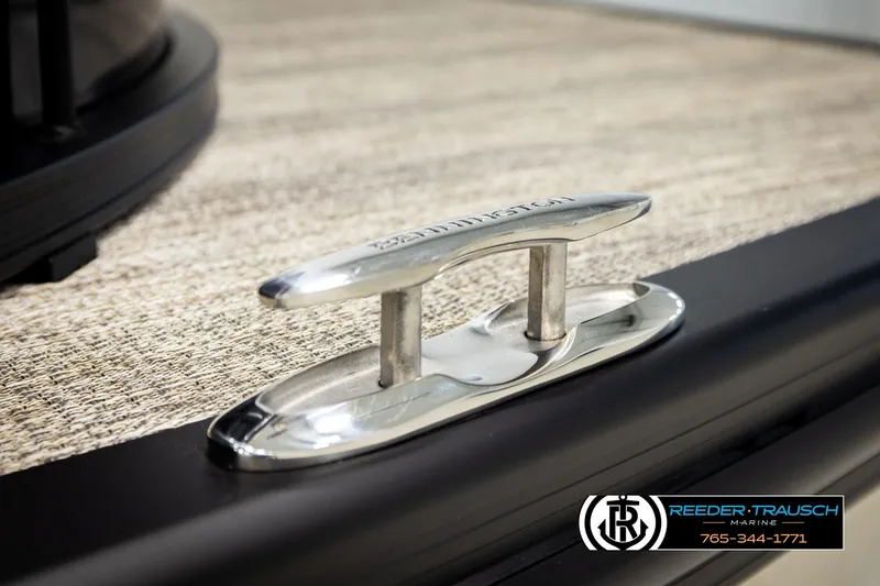 Slide: The Image of Close-up of a 2026 Bennington MFBSE boat cleat on textured surface. - 53