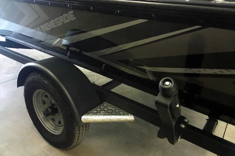 Slide: The Image of 2024 Lund 1775 Renegade boat trailer with black finish and sturdy wheel. - 10