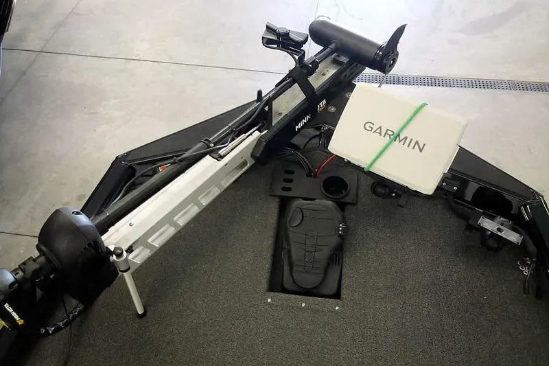 Slide: The Image of 2024 Lund 1775 Renegade boat with Garmin equipment and Minn Kota trolling motor. - 18