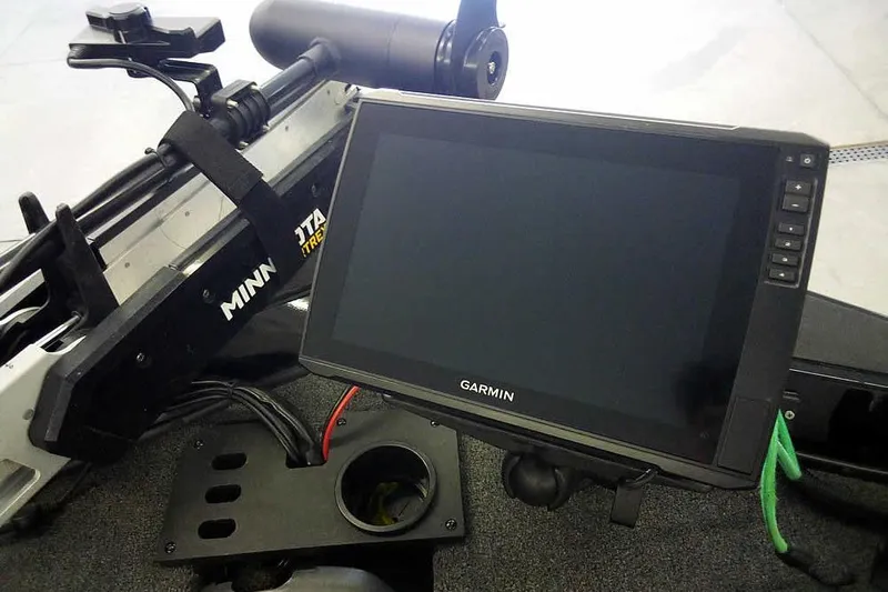 Slide: The Image of 2024 Lund 1775 Renegade boat with Garmin display and Minn Kota trolling motor. - 19