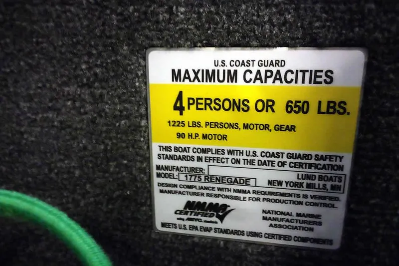 Slide: The Image of 2024 Lund 1775 Renegade boat capacity label, 4 persons or 650 lbs, 90 HP motor. - 25