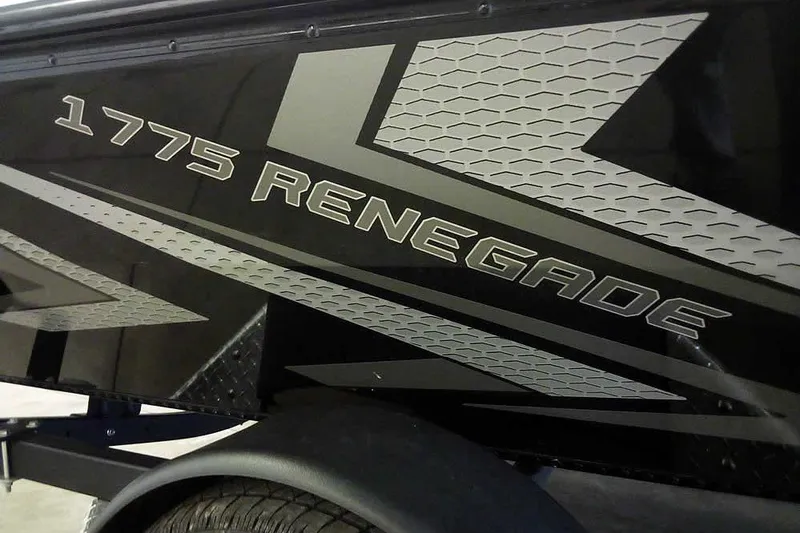 Slide: The Image of 2024 Lund 1775 Renegade boat with sleek black and silver graphics. - 3