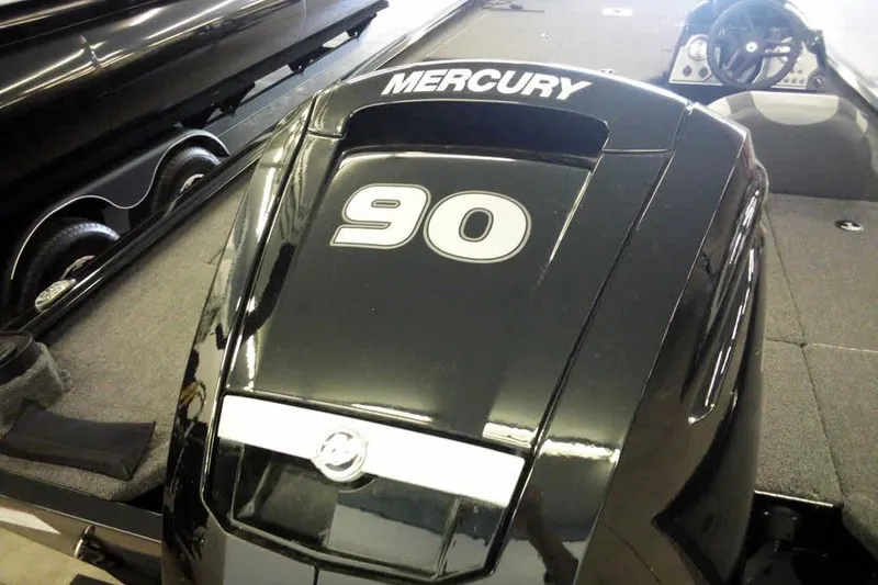 Slide: The Image of 2024 Lund 1775 Renegade boat with Mercury 90 engine, interior view. - 32