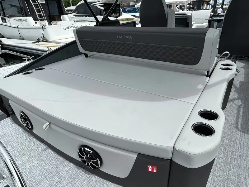 Slide: The Image of Harris Sunliner 230 2026 with stylish seating area and cup holders. - 10