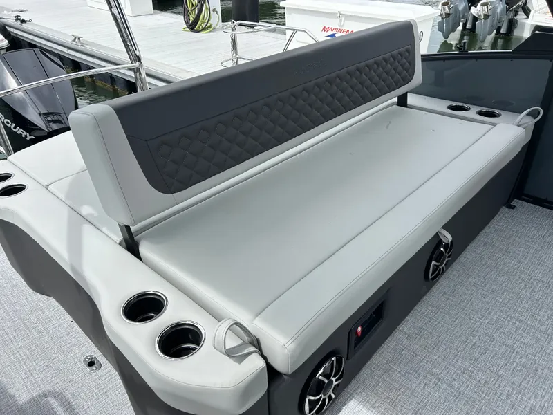 Slide: The Image of Harris Sunliner 230 2026 boat seat with cup holders and speakers. - 12