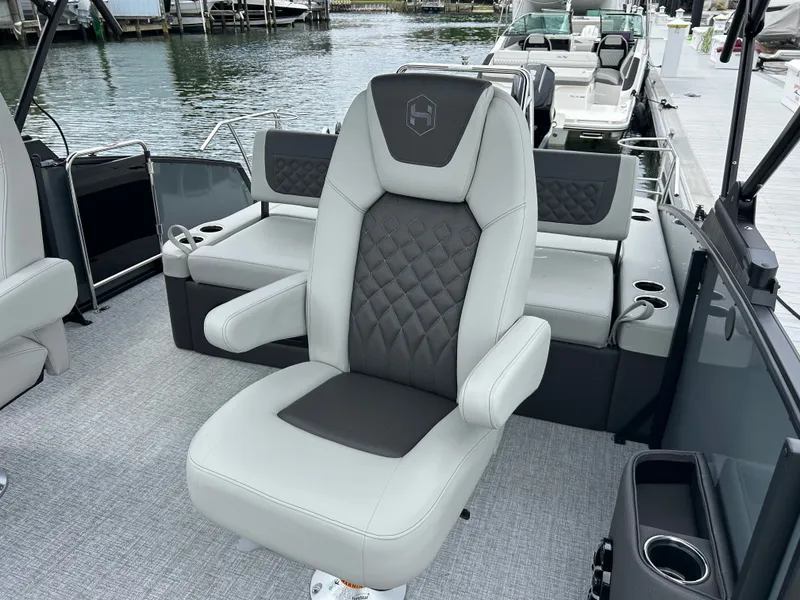 Slide: The Image of Luxurious seating on Harris Sunliner 230 boat, model year 2026. - 13