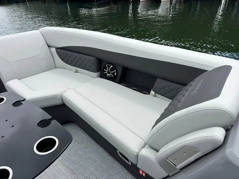 Slide: The Image of Luxurious seating on Harris Sunliner 230 pontoon boat, model 2026. - 18