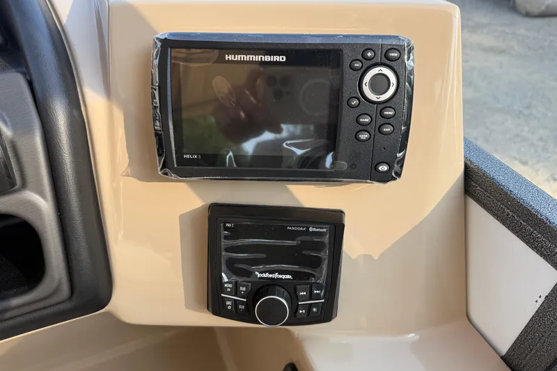 Slide: The Image of Control panel of 2026 Bentley Pontoons Legacy 243 Swingback EXT with Humminbird and Rockford Fosgate systems. - 13